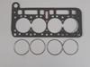 Head gasket with separate bore rings in composite material for competition use.